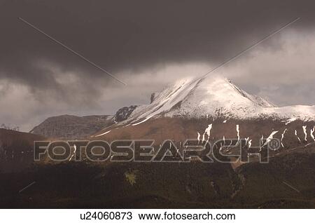 Snow Capped Mountain Peak, Jasper National Park, Canada View Large Photo Image Stock Image - Snow Capped Mountain Peak, Jasper National Park, Canada. Fotosearch