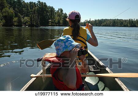 Two Girls in Canoe View Large Photo Image Stock Photography - Two Girls in Canoe. Fotosearch