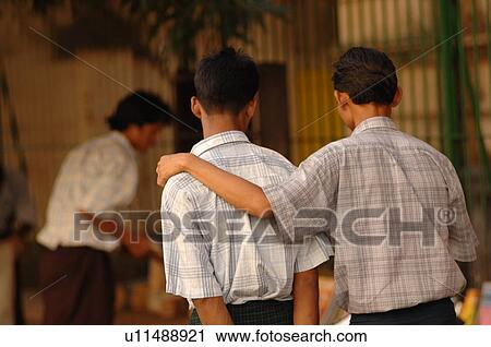 Back view of two men View Large Photo Image Stock Image - Back view of two men. Fotosearch