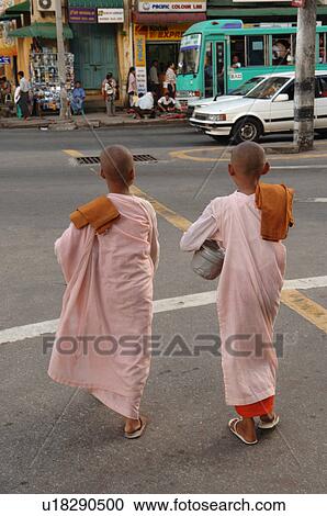Back view of two young Burmese monks View Large Photo Image Stock Image - Back view of two young Burmese monks. Fotosearch