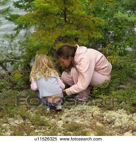 Two girls in forest View Large Photo Image Stock Photography - Two girls in forest. Fotosearch