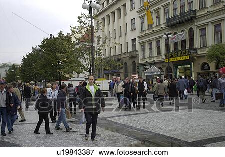 People walking on the sidewalk in Prague View Large Photo Image Stock Photo - People walking on the sidewalk in Prague. Fotosearch