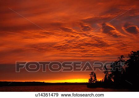 Crimson Sky Over Lake Of The Woods Stock Photo U Fotosearch