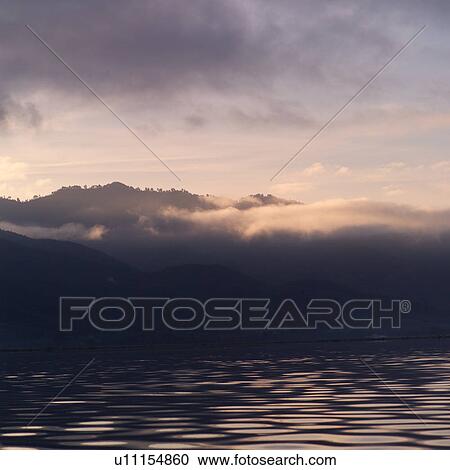 Dark skies over Inle Lake View Large Photo Image Stock Image - Dark skies over Inle Lake. Fotosearch