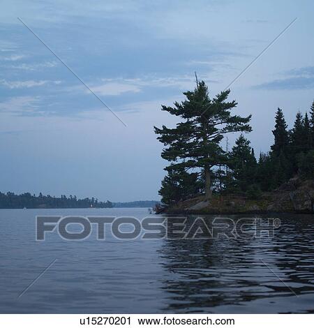 Stock Image - Lake of the Woods at Twilight. Fotosearch