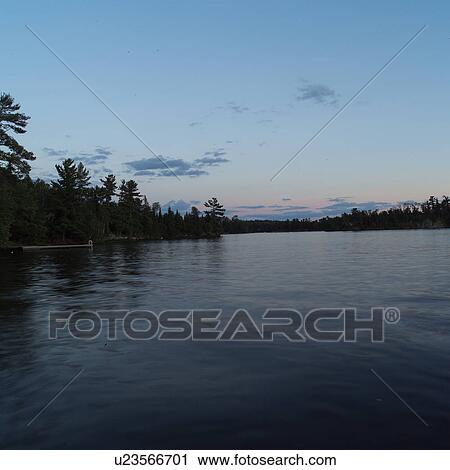 Stock Image - Lake of the Woods at Twilight. Fotosearch