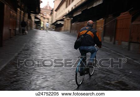 Biker on Road in Florence View Large Photo Image Stock Photography - Biker on Road in Florence. Fotosearch