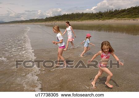 Children on beach View Large Photo Image Stock Photography - Children on beach. Fotosearch