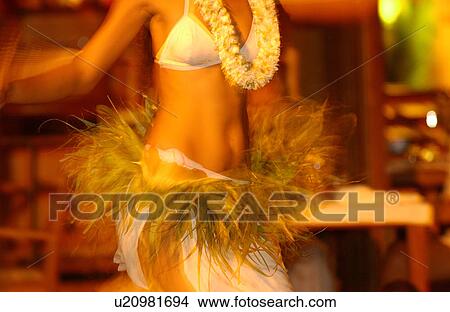 Picture - Close-up of a young female Tahitian dancer. Fotosearch
