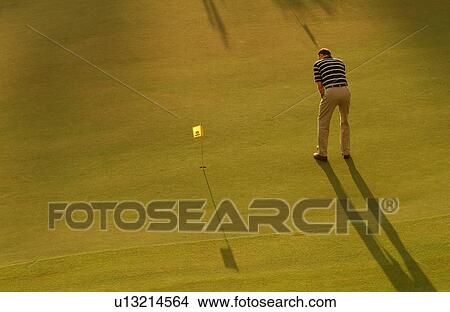 Man on Golf Course View Large Photo Image Picture - Man on Golf Course. Fotosearch