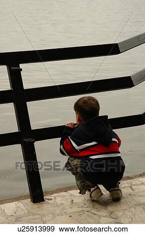 Boy Looking at Water View Large Photo Image Stock Photo - Boy Looking at Water. Fotosearch