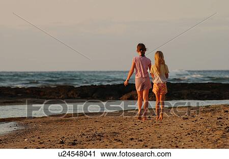 Kids playing on beach View Large Photo Image Stock Image - Kids playing on beach. Fotosearch