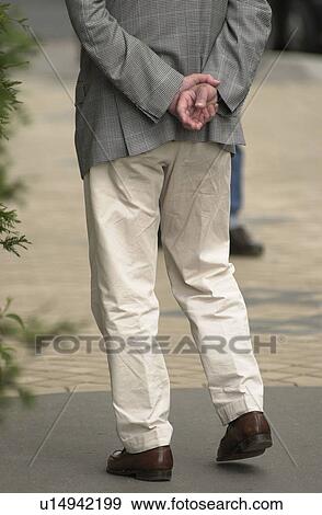 Stock Photo - Man Taking a Stroll. Fotosearch