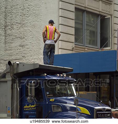 Stock Photo - Worker, New York City. Fotosearch