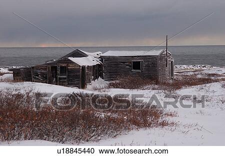 Stock Image - Churchill Northern Manitoba town and surroundings Cabin by Shoreline. Fotosearch