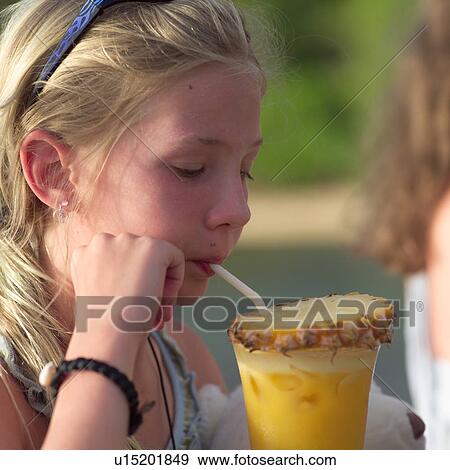 Blond Child Drinking Tropical Drink View Large Photo Image Stock Photo - Blond Child Drinking Tropical Drink. Fotosearch