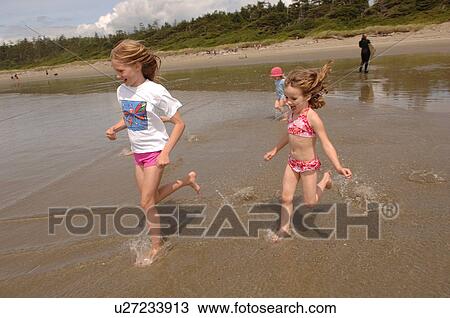 Children on beach View Large Photo Image Stock Image - Children on beach. Fotosearch