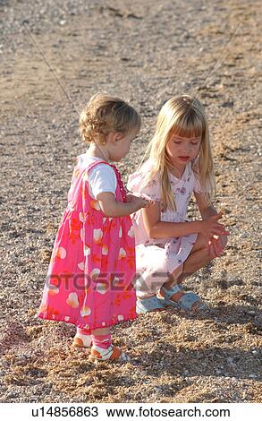 Stock Image - Children playing in Gimli. Fotosearch