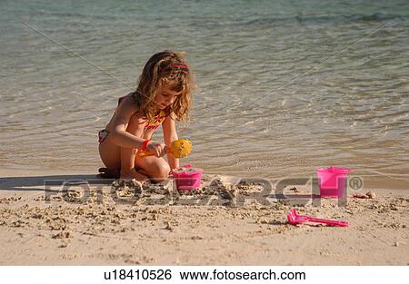 Stock Photograph - Young Girl at the Beach. Fotosearch
