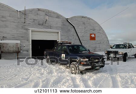 Stock Image - Churchill Northern Manitoba town and surroundings Truck in front of compound. Fotosearch
