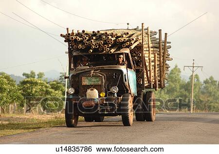 Truck carrying logs View Large Photo Image Stock Photograph - Truck carrying logs. Fotosearch