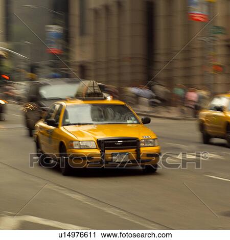 Yellow taxis in traffic, New York City View Large Photo Image Stock Image - Yellow taxis in traffic, New York City. Fotosearch