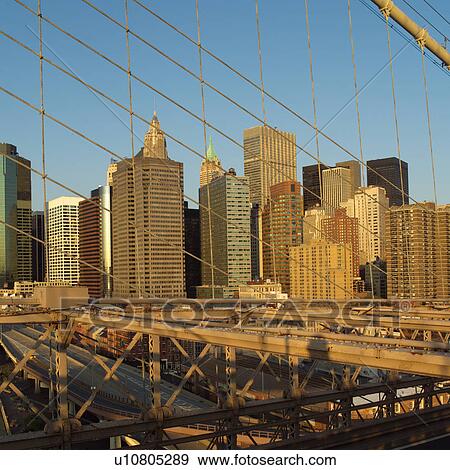 Stock Photo - Manhattan skyline from Brooklyn Bridge, New York City. Fotosearch