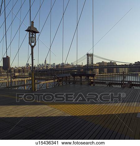 View of Manhattan Bridge from Brooklyn Bridge, New York City View Large Photo Image Stock Image - View of Manhattan Bridge from Brooklyn Bridge, New York City. Fotosearch