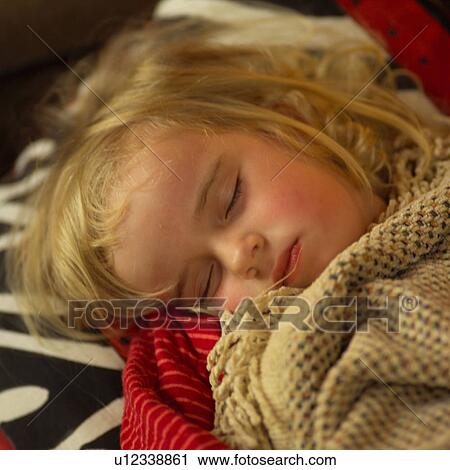 Close-up of a girl sleeping View Large Photo Image Stock Image - Close-up of a girl sleeping. Fotosearch