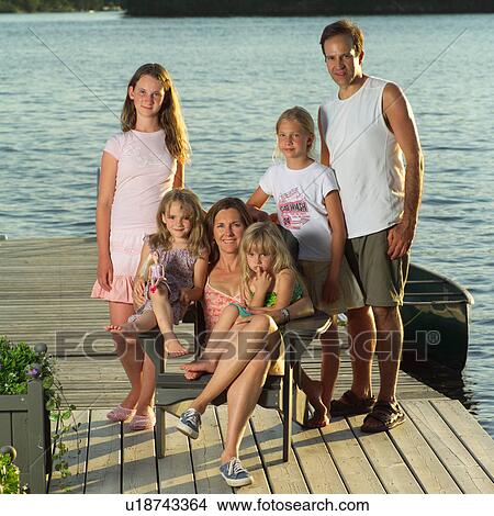Picture - Family posing. Fotosearch