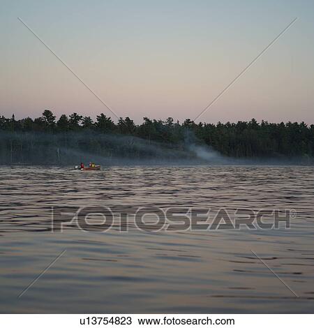 Stock Image - Lake of the Woods at Twilight. Fotosearch