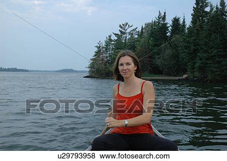 Woman in Boat View Large Photo Image Stock Photo - Woman in Boat. Fotosearch