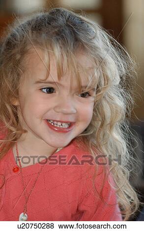 Stock Photo - Girl with long curly hair. Fotosearch