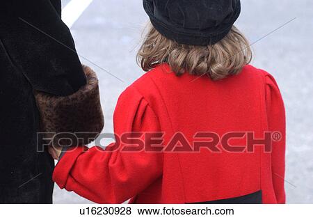 Stock Photo - Young girl holding an adult's hand. Fotosearch