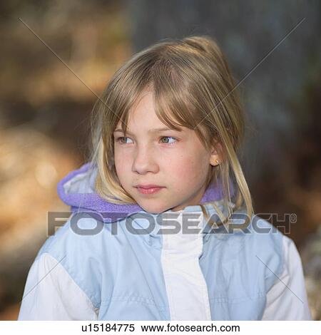 Stock Photography - Young girl looking sideways. Fotosearch