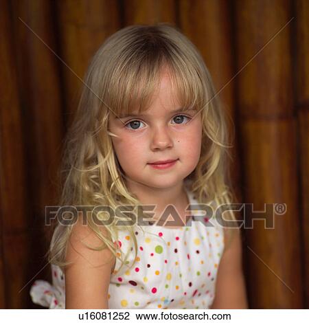 Stock Image - 3 Year Old Looking at Camera. Fotosearch