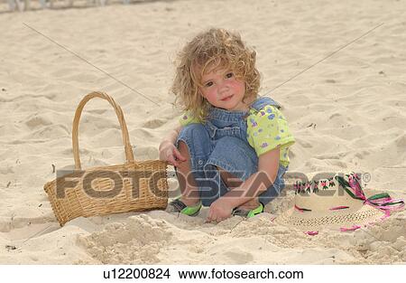 Child on beach View Large Photo Image Picture - Child on beach. Fotosearch