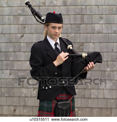 Stock Image - Girl Playing Bagpipes. Fotosearch