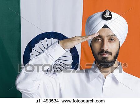 Picture - Portrait of a young man saluting. Fotosearch