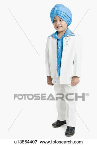 Stock Photo - Boy standing and smiling . Fotosearch