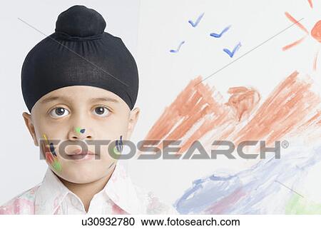 Portrait of a boy in front of a painting View Large Photo Image Stock Image - Portrait of a boy in front of a painting. Fotosearch