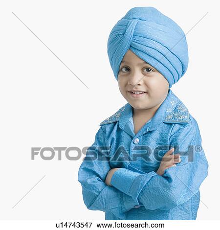 Portrait of a boy smiling with his arms crossed View Large Photo Image Stock Photo - Portrait of a boy smiling with his arms crossed . Fotosearch