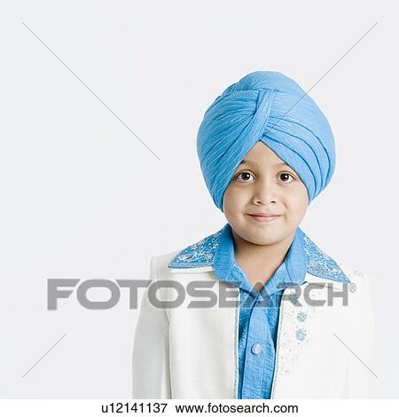 Stock Photo - Portrait of a boy smirking . Fotosearch