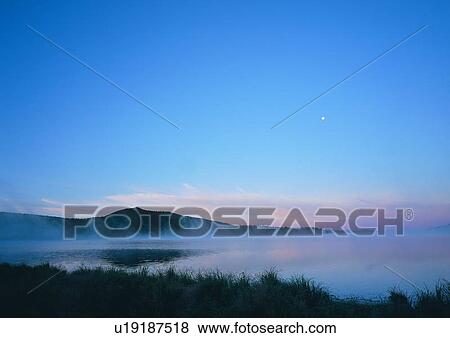 Stock Photo - Blue, Clear Sky, Coast, Dark, Dusk. Fotosearch