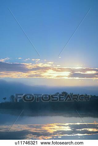 Stock Image - Blue, Cloud, Dusk, Glow, Horizon. Fotosearch