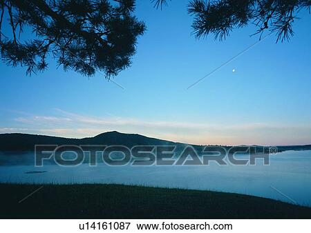 Stock Photo - Blue, Coast, Dusk, Foggy, Haze. Fotosearch