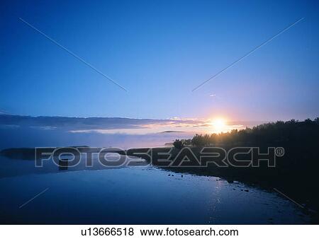 Stock Photo - Blue, Coast, Dusk, Glow, Horizon. Fotosearch
