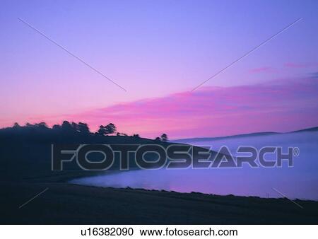 Stock Image - Light, Pink, Dusk, Sunset, Blue, Rain Cloud. Fotosearch