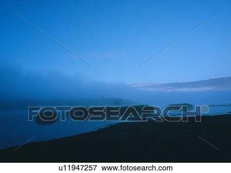 Stock Photo - Twilight, Travel Destinations, Fog, Nature, Scenics, Sky. Fotosearch