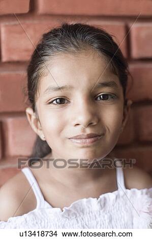 Portrait of a girl smirking View Large Photo Image Picture - Portrait of a girl smirking. Fotosearch